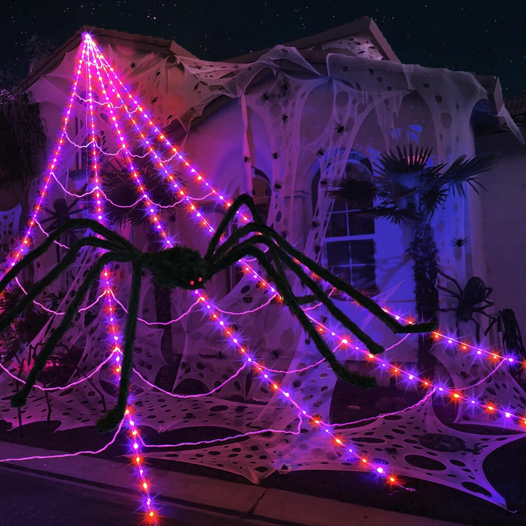 Halloween-lampjes in de vorm van een gloeiend spinnenwe
