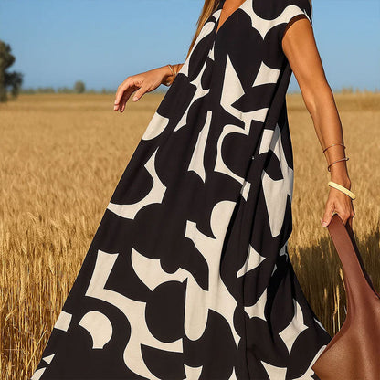 🌟Tijdelijke aanbieding 49% KORTING🥰Geometrische print · V-hals hoge taille lange rok