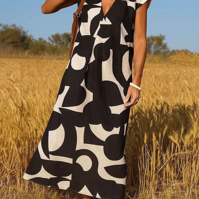 🌟Tijdelijke aanbieding 49% KORTING🥰Geometrische print · V-hals hoge taille lange rok