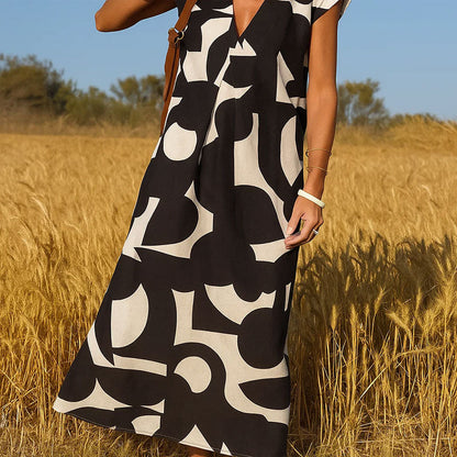 🌟Tijdelijke aanbieding 49% KORTING🥰Geometrische print · V-hals hoge taille lange rok