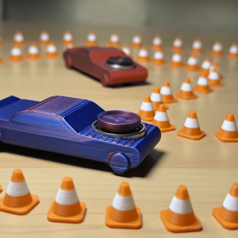 🏎️ De FidgetDrifter | Draagbaar drift-speelgoedautootje